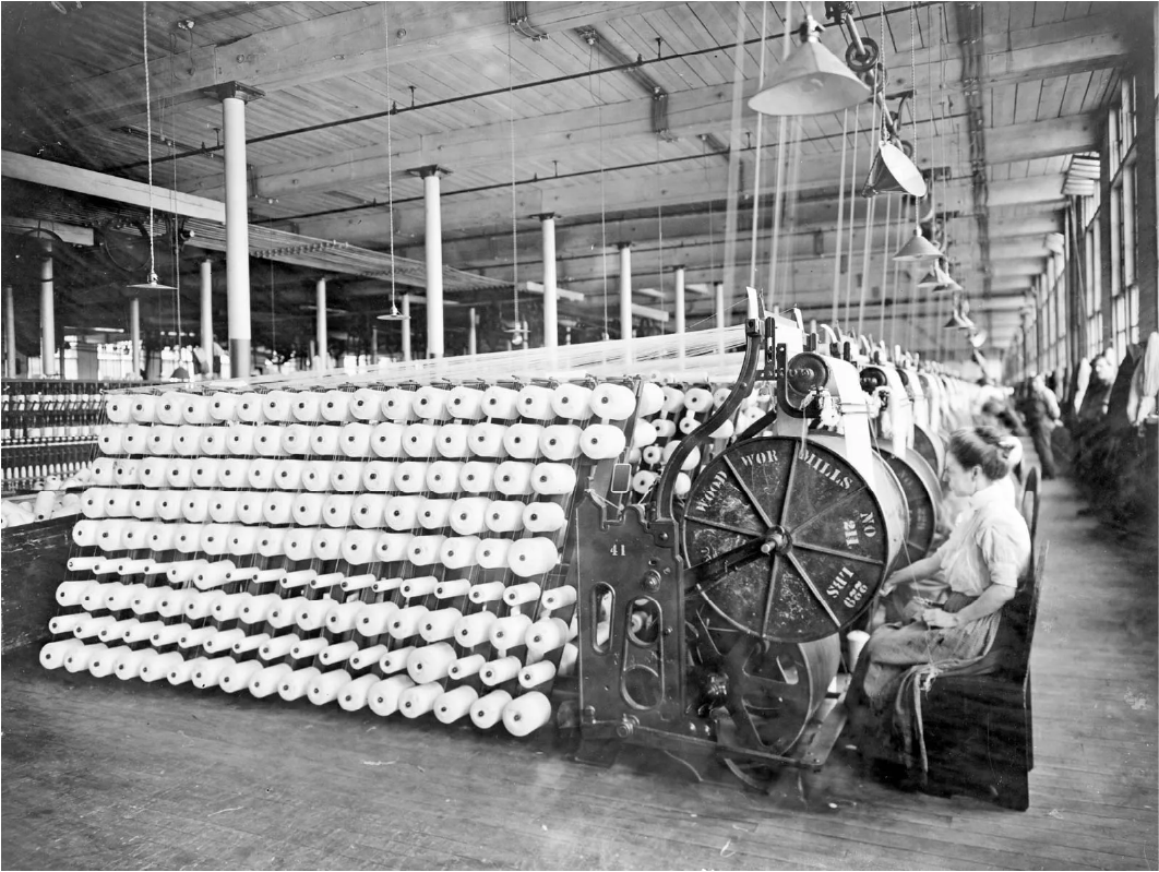 Industrial Revolution factory workersWomen working machines at the American Woolen Company Boston c